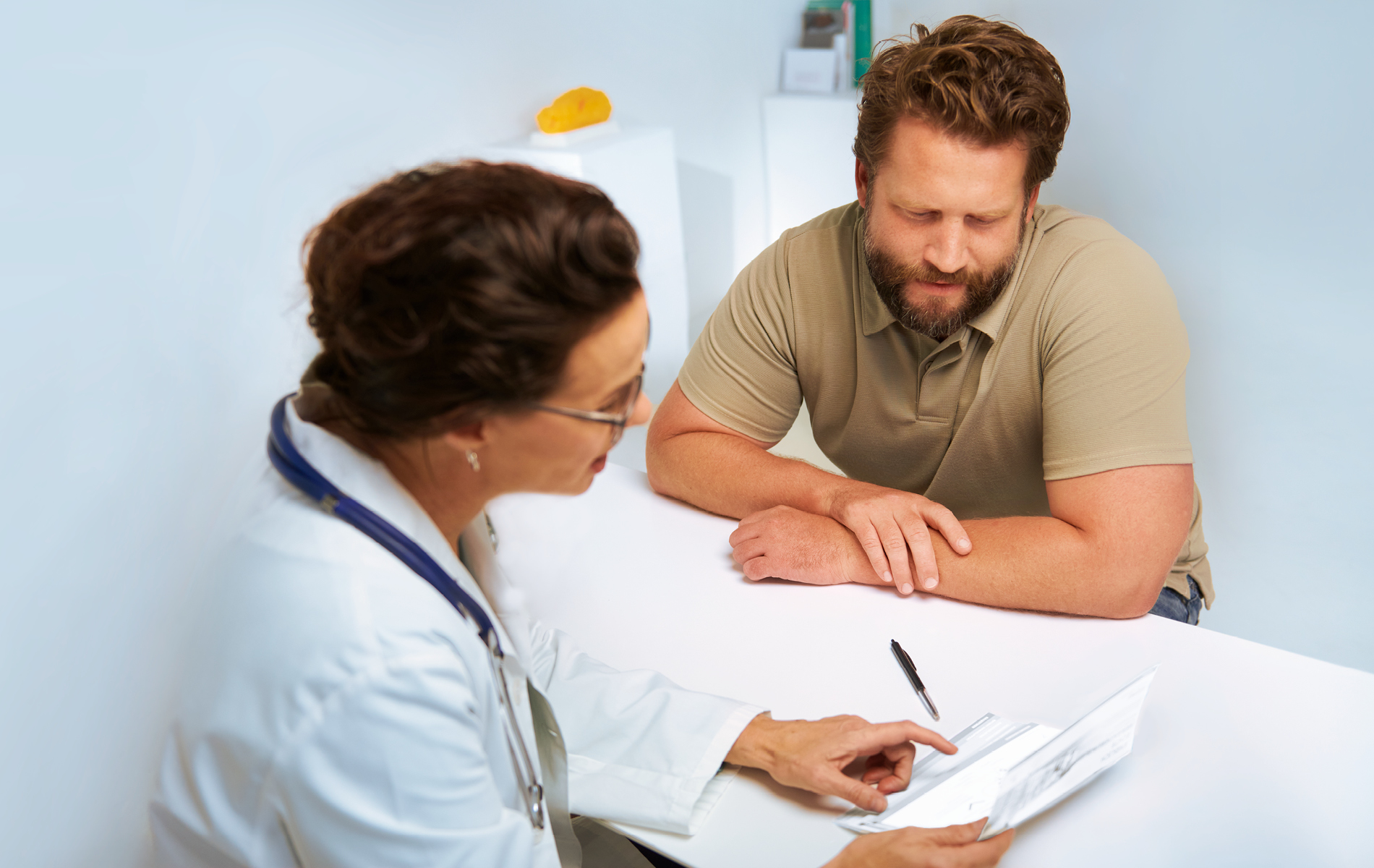 Woman speaking to doctor
